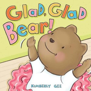 The cover of the book Glad, Glad Bear! The illustration is of a smiling bear raising its arms and wearing a pink tutu.