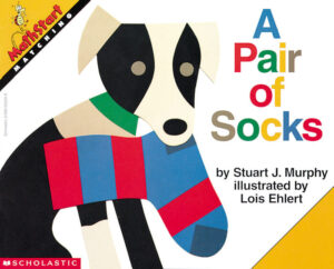 The cover of the book A Pair of Socks. The illustration is of a dog holding a sock in its mouth.